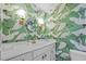 Charming bathroom features vanity and patterned wallpaper at 926 Wimbleton Dr, Raleigh, NC 27609