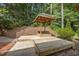 Backyard gazebo on a wooden deck features steps and overlooks the wooded back yard at 926 Wimbleton Dr, Raleigh, NC 27609