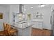 Bright kitchen featuring a center island, stainless appliances, and plenty of storage at 926 Wimbleton Dr, Raleigh, NC 27609