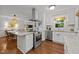 Well-equipped kitchen with stainless steel appliances, granite countertops, and modern finishes at 926 Wimbleton Dr, Raleigh, NC 27609