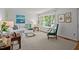 Inviting living room with a large window, comfortable seating, and stylish decor at 926 Wimbleton Dr, Raleigh, NC 27609