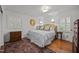Relaxing main bedroom features natural light, rug and dresser at 926 Wimbleton Dr, Raleigh, NC 27609
