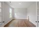 Bright living room with hardwood floors and natural light, perfect for relaxation and entertaining at 94 Black Walnut Dr # 201, Garner, NC 27529