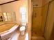 A comfortable bathroom area with walk-in shower and soaking tub at 94 S Waters Edge Ln, Henderson, NC 27537