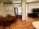 Bright dining area with wood floors and natural light at 94 S Waters Edge Ln, Henderson, NC 27537