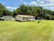 Single-story home featuring a spacious yard, perfect for outdoor activities and relaxation at 94 S Waters Edge Ln, Henderson, NC 27537