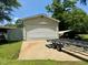 A spacious detached garage with additional covered parking awaits at 94 S Waters Edge Ln, Henderson, NC 27537