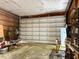 A large garage door is visible, offering easy access and plenty of storage space at 94 S Waters Edge Ln, Henderson, NC 27537