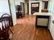 Open living space with fireplace and wood floors at 94 S Waters Edge Ln, Henderson, NC 27537
