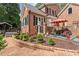 Inviting backyard patio with outdoor seating and lush landscaping at 9940 Koupela Dr, Raleigh, NC 27614