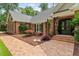 Beautiful brick home with an inviting front entrance and lush landscaping at 9940 Koupela Dr, Raleigh, NC 27614