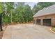 Spacious garage with ample parking and additional outdoor amenities at 9940 Koupela Dr, Raleigh, NC 27614