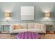 Chic living room featuring plush seating, modern tables, and a minimalist painting for a sleek, inviting vibe at 9940 Koupela Dr, Raleigh, NC 27614