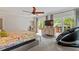 Serene primary bedroom with access to a deck, neutral decor, and ample natural light at 9940 Koupela Dr, Raleigh, NC 27614