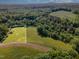 Beautiful aerial view of homesite 10 surrounded by lush greenery and ready for your custom-built dream home at Tbd Lot 10 Montgomery Estates Rd, Hillsborough, NC 27278