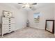 Bright and airy bedroom with neutral walls and furniture at 10 Oxford Dr, Angier, NC 27501
