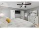 View of the main bedroom featuring gray walls, white trim, and ensuite bathroom at 10 Oxford Dr, Angier, NC 27501