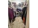 Walk-in closet with ample storage, shelving, and hanging space for organized living at 10 Oxford Dr, Angier, NC 27501