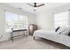 Bedroom featuring a desk and chair, dresser and a queen sized bed at 100 Fountain Springs Rd, Holly Springs, NC 27540