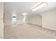 Massive bonus room with plush carpeting, neutral colors, and windows for natural light at 1005 Enderbury Dr, Raleigh, NC 27614