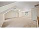 Expansive bonus room is complete with plush carpeting, neutral walls, and natural light at 1005 Enderbury Dr, Raleigh, NC 27614
