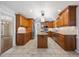 Spacious kitchen boasting custom cabinetry, granite countertops, and modern appliances at 1005 Enderbury Dr, Raleigh, NC 27614