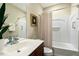 Cozy bathroom with classic fixtures, a framed mirror, and a shower-tub combination at 1034 Ventnor Pl, Cary, NC 27519