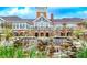 The beautiful community clubhouse has cascading water features and meticulously maintained grounds at 1034 Ventnor Pl, Cary, NC 27519