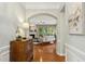 Inviting foyer with hardwood floors that leads into the living room and other living spaces at 1034 Ventnor Pl, Cary, NC 27519