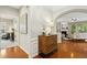 Foyer with hardwood floors and an archway leading into the living room at 1034 Ventnor Pl, Cary, NC 27519