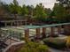 Community recreation area featuring bocce ball courts, lush landscaping, and walking paths at 1034 Ventnor Pl, Cary, NC 27519