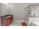 Bathroom featuring a shower, granite countertop vanity, and tile flooring at 111 Revere Forest Ct, Cary, NC 27519