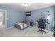 Serene bedroom with a modern workspace and comfortable furnishings at 111 Revere Forest Ct, Cary, NC 27519