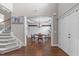 Welcoming foyer showcasing hardwood floors, staircase, and an open view into the formal dining room at 111 Revere Forest Ct, Cary, NC 27519