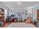 Cozy home office with built-in shelving, an executive desk, and natural light, perfect for productivity at 111 Revere Forest Ct, Cary, NC 27519