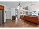 Open-concept living room features hardwood floors and seamless access to kitchen at 111 Revere Forest Ct, Cary, NC 27519