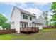 Back exterior view of the home showing the patio and fenced in yard at 1111 Barrow Nook Ct, Apex, NC 27502