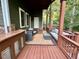 Outdoor deck featuring comfortable patio seating and wooded views at 1113 Bexley Hills Bend Bnd, Apex, NC 27502
