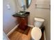 Powder room featuring a modern glass bowl sink and pedestal with a sleek design at 1113 Bexley Hills Bend Bnd, Apex, NC 27502