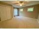 Bedroom includes a ceiling fan, a neutral color scheme, and plenty of natural light at 1113 Bexley Hills Bend Bnd, Apex, NC 27502