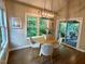 Bright breakfast nook with windows and sliding glass doors to the outdoor space at 1113 Bexley Hills Bend Bnd, Apex, NC 27502