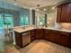 Stylish kitchen with stainless steel appliances, granite countertops, and wooden cabinets at 1113 Bexley Hills Bend Bnd, Apex, NC 27502