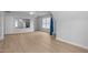 A bonus room with a large mirror, vinyl plank flooring, and plenty of space at 114 Council Gap Ct, Cary, NC 27513