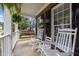Charming front porch featuring rocking chairs and a swing, perfect for relaxing outdoors at 114 Council Gap Ct, Cary, NC 27513