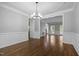 Spacious living area that connects the dining room, foyer, and other living spaces in the home at 114 Council Gap Ct, Cary, NC 27513