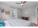 Bright bedroom features hardwood floors, natural lighting, and neutral wall colors at 1209 Edgevale Rd, Durham, NC 27701