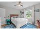 Comfortable bedroom features hardwood floors, natural lighting, and neutral wall colors at 1209 Edgevale Rd, Durham, NC 27701