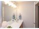 Bathroom featuring a long vanity with white countertop and soft lighting, perfect for morning routines at 12320 Tetons Ct, Durham, NC 27703