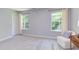 Bedroom, features two white upholstered chairs and a writing desk with drawers at 12320 Tetons Ct, Durham, NC 27703