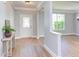 Bright foyer with new floors leading to a large, open living area at 12320 Tetons Ct, Durham, NC 27703